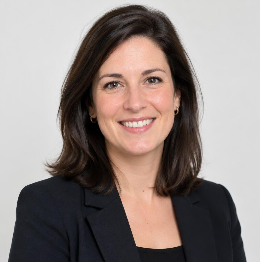 Portrait of a smiling woman in a blazer