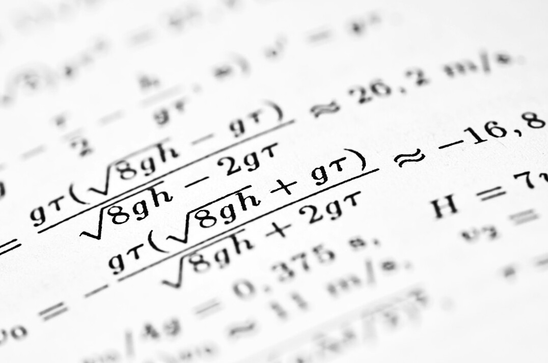 Printed inspection report with calculator on a desk