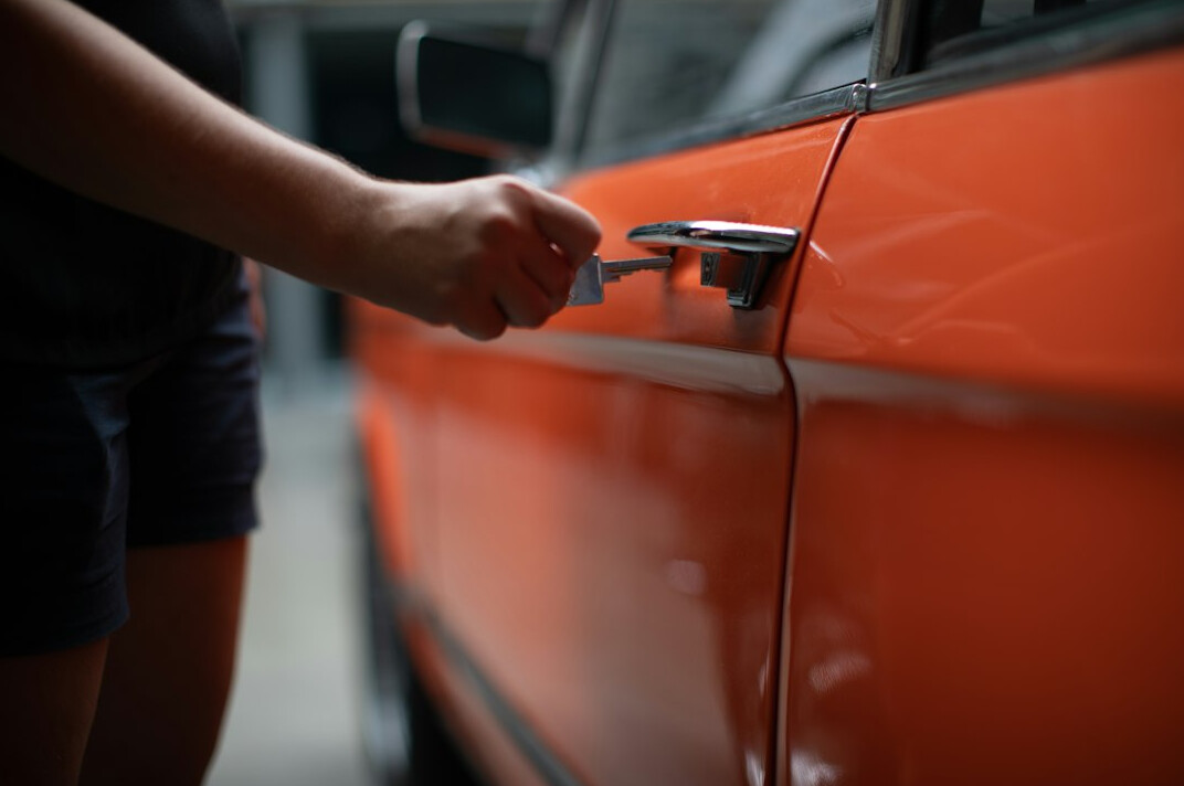 Handing over car keys after a vehicle purchase